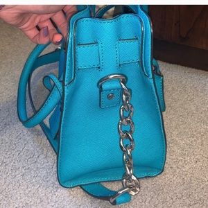 Turquoise Michael Kors handbag